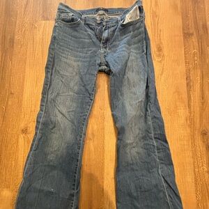 Seven for all mankind jeans, has hole in between thighs.